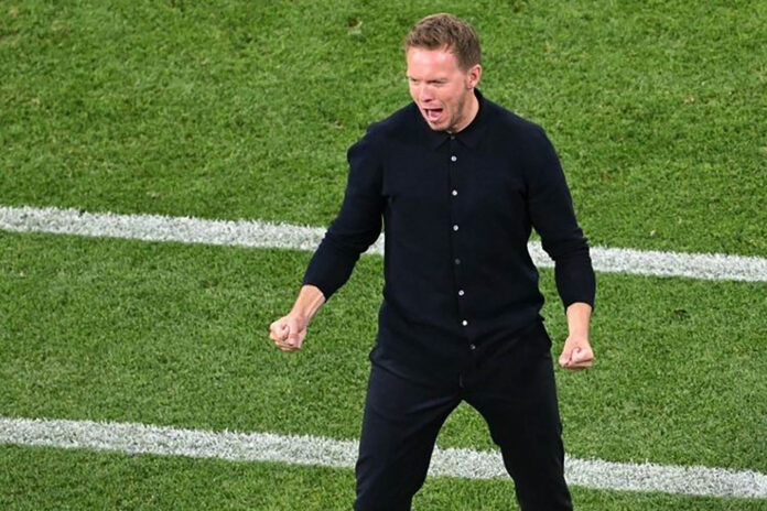 Pelatih Timnas Jerman, Julian Nagelsmann, mencatatkan sejarah pada laga pembuka Piala Eropa 2024 Jerman vs Skotlandia, Jumat (14/6/2024) atau Sabtu dini hari WIB.(Foto: AFP)